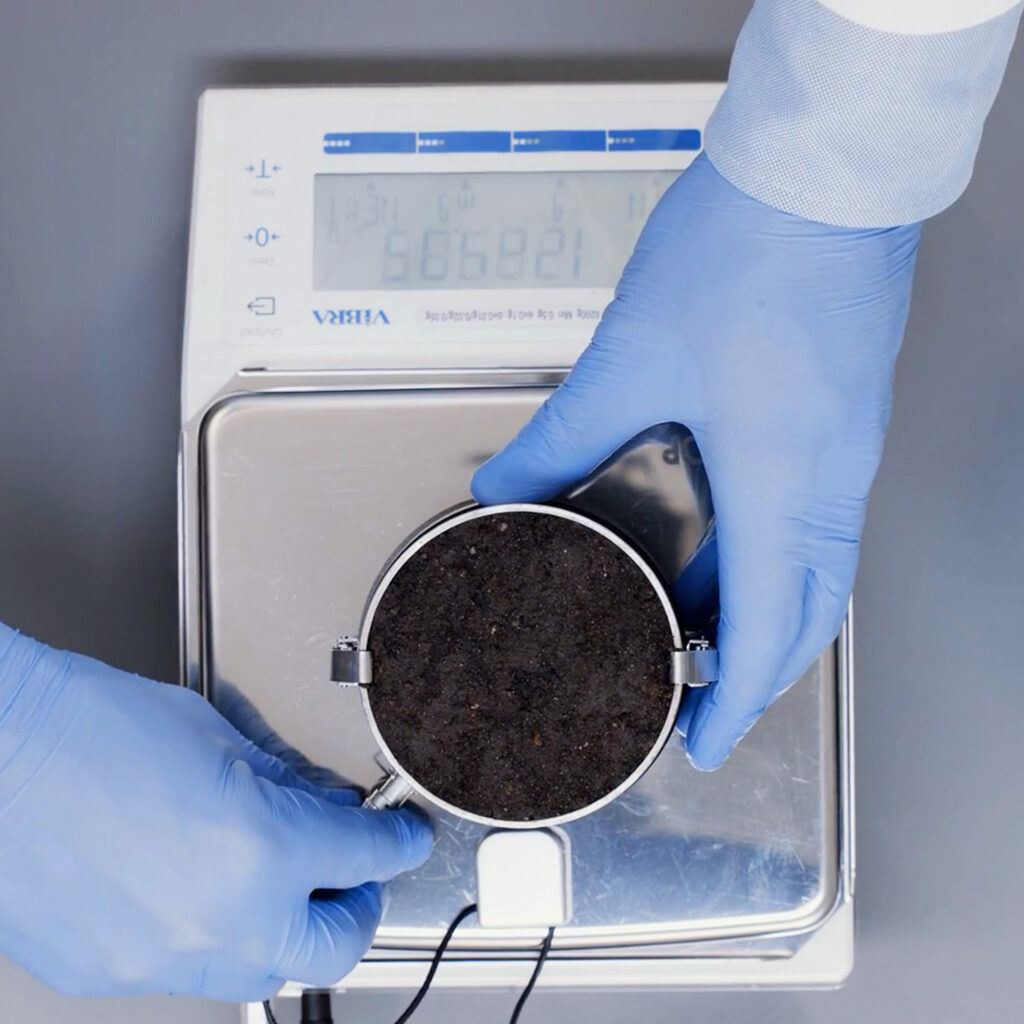 A researcher prepping a sample on the HYPROP